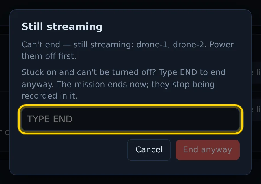 The "Still streaming" box: "Can't end — still streaming: drone-1, drone-2. Power them off first." with a Type END box, Cancel and End anyway